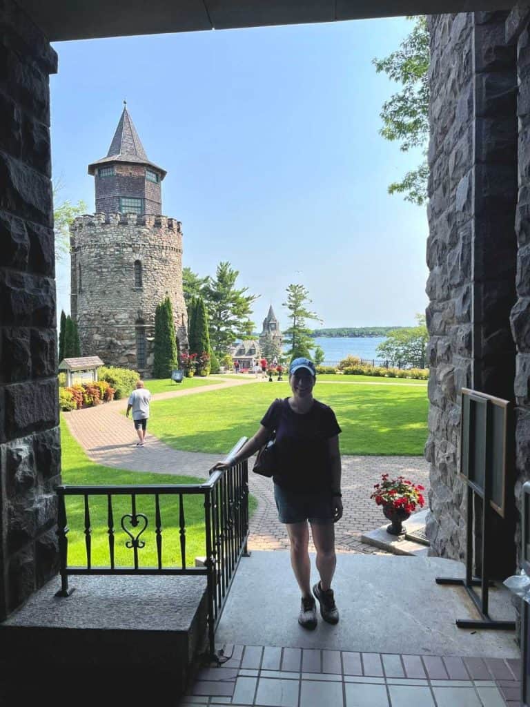 View of Boldt Castle and the St. Lawrence River framed by an arched doorway