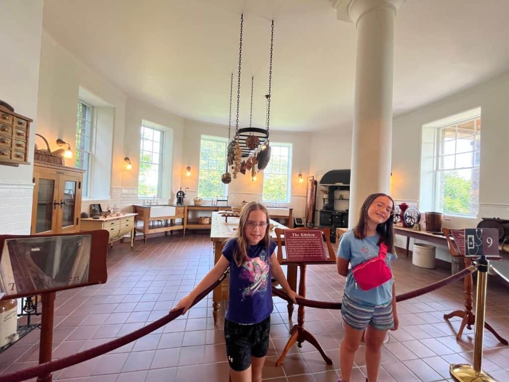 Children exploring the restored kitchen inside Boldt Castle